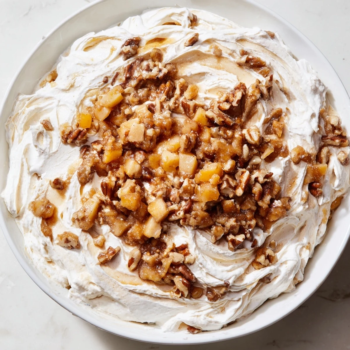 Creamy spiced apple praline whip dip, perfect for fruit and savory snacks.  