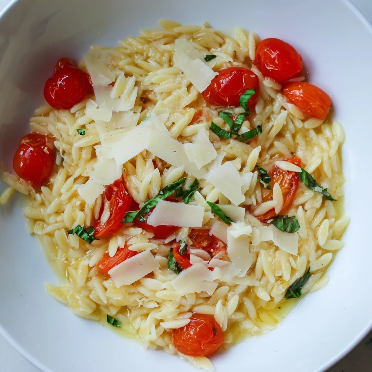 Bright and flavorful Orzo Tomato Parmesan, a perfect vegetarian Italian pasta dish with fresh ingredients.