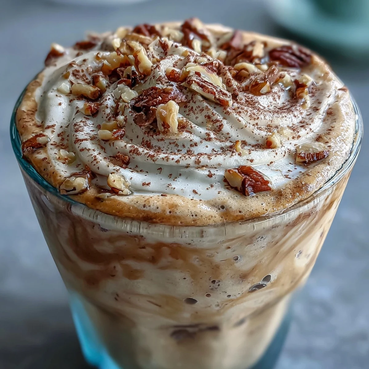 The Hojicha milkshake showcases a rich roasted tea color and a cozy aroma.