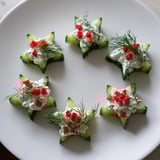 Fresh cucumber and dill Christmas stars, ready to serve, offer a delightful holiday appetizer.