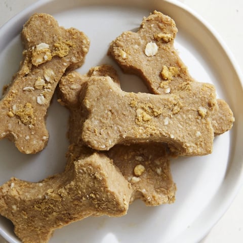 Pawsitively Good Dog Bone Treats, golden-brown and crunchy, perfect for rewarding your happy pup.