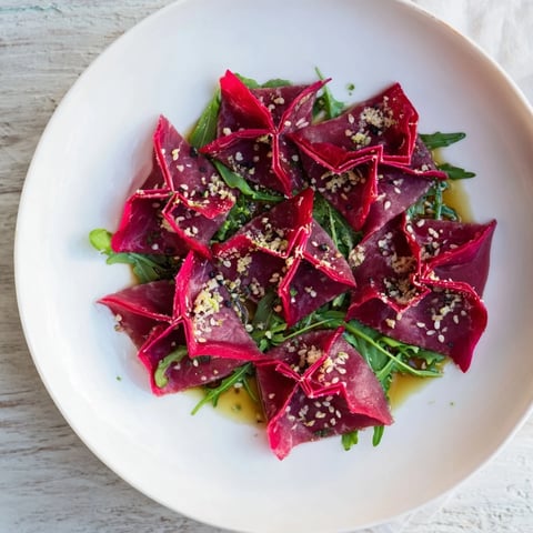 Elegant Origami Fold Beef Appetizer, arranged beautifully, ready to impress your guests with its fresh flavors.