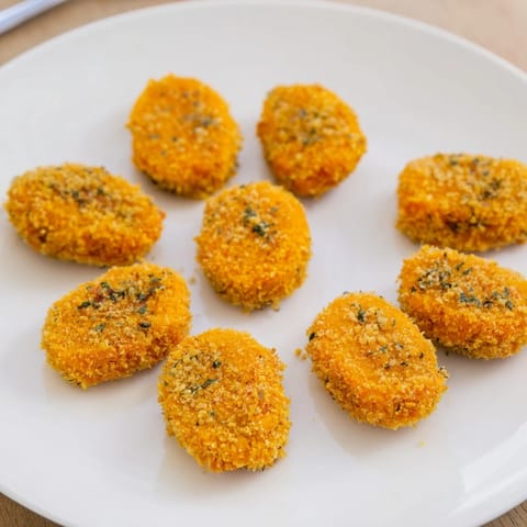 Crunchy Holiday Snack Pumpkin Nuggets served on a festive plate, perfect for sharing.  