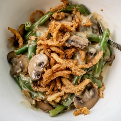 Classic Old-School Green Bean Casserole, a comforting dish with savory mushrooms and creaminess.  