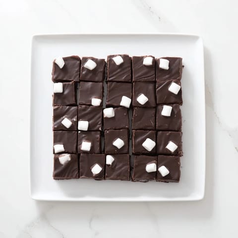 This homemade Easy Marshmallow Fudge is smooth, rich, and perfect for sharing with family.