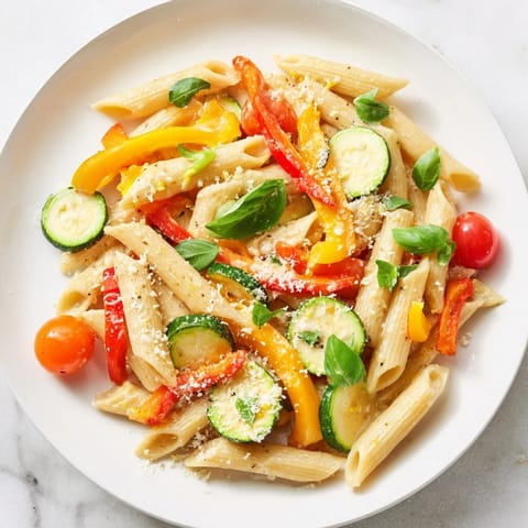 This photo shows a creamy One-Pot Creamy Pasta Primavera: a bowl of comfort, hot and ready.