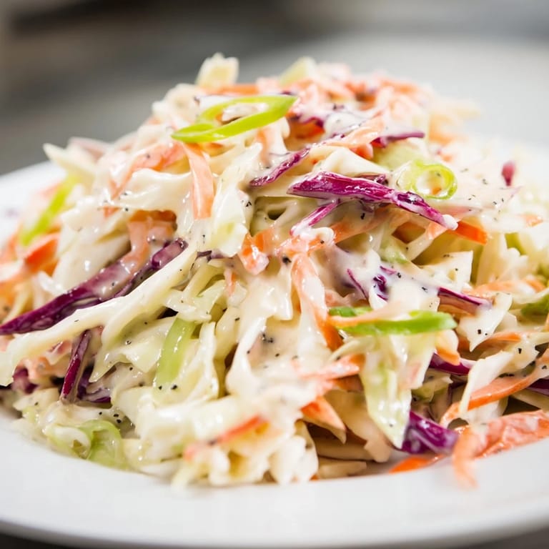 This beautiful bowl of Quick Coleslaw Salad features vibrant shredded vegetables.